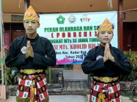 Foto: Atlet peraih juara 1, cabang olahraga pencak silat ganda putra delegasi Kabupaten Pamekasan di Porseni tingkat MTs se-Jawa Timur di Malang.
